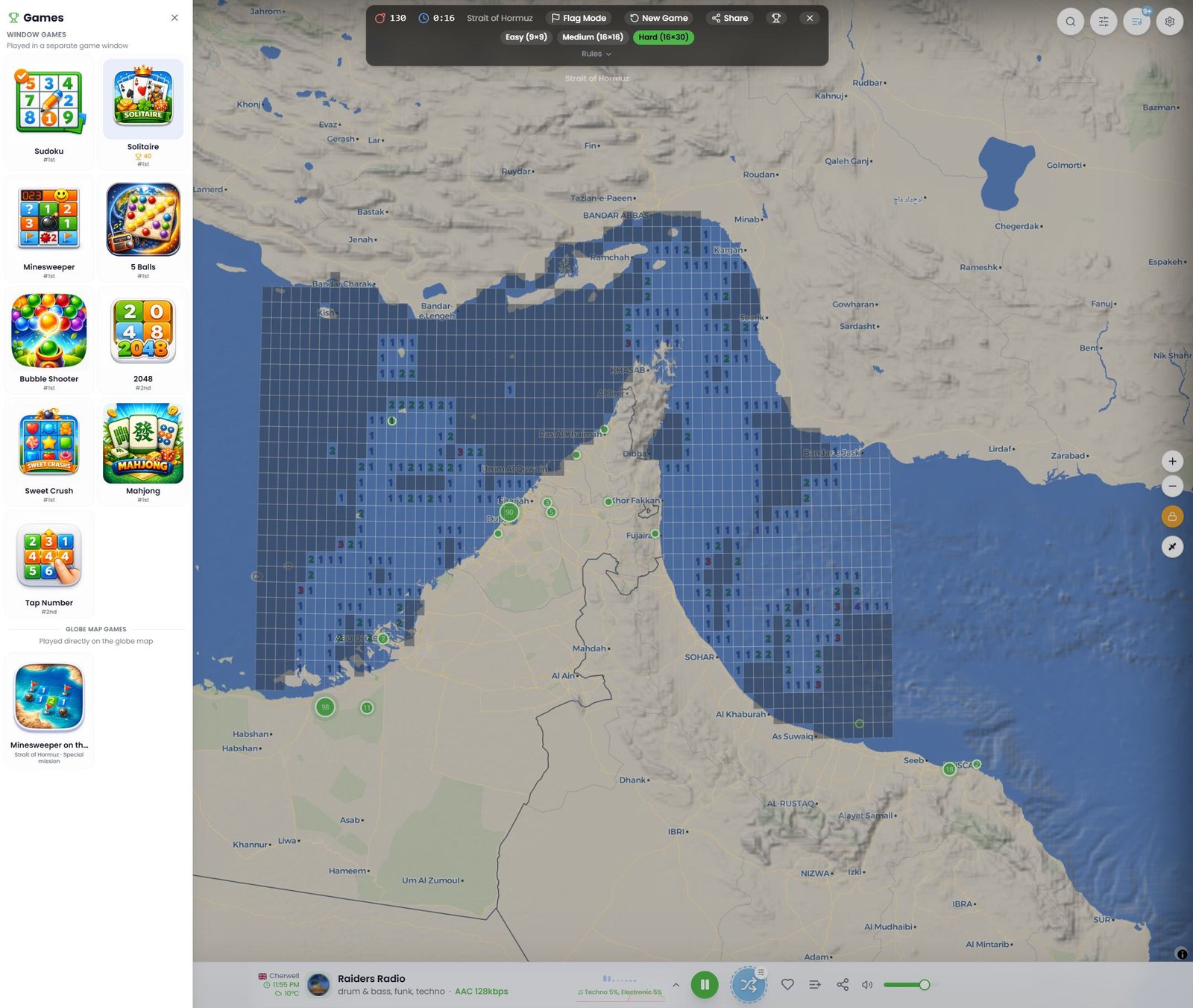 TuneJourney built-in games panel with Minesweeper played on the globe map